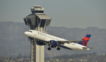 N360NW @ KLAX - Departing LAX on 25R - by Todd Royer