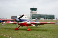 F-TGCI @ LFRN - Extra EA-330SC, Static display, Rennes-St Jacques airport (LFRN-RNS) Air show 2014 - by Yves-Q