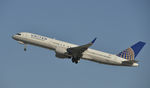 N589UA @ KLAX - Departing LAX on 25R - by Todd Royer