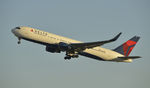 N187DN @ KLAX - Departing LAX on 25R - by Todd Royer