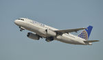 N412UA @ KLAX - Departing LAX on 25R - by Todd Royer