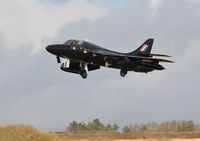 G-FFOX @ EGFH - Ex-RAF Hunter T.7A s/n WV318 now in the 'Black Arrows' scheme carried by aircraft of 111 Sqaudron RAF from 1956 to 1960. Seen pulling up after making a practice approach to Runway 22. - by Roger Winser
