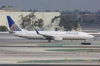 N77431 @ KLAX - Boeing 737-900ER - by Mark Pasqualino