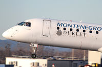4O-AOA @ LOWW - Montenegro Airlines - by Thomas Ranner