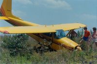 N169DP @ 5A9 - Ran out of fuel after dropping skydivers, landed short of the runway, nobody hurt - by Mike Hecker