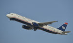 N558UW @ KLAX - Departing LAX on 25R - by Todd Royer