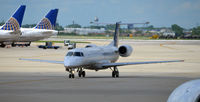N158GJ @ KORD - Taxi O'Hare - by Ronald Barker