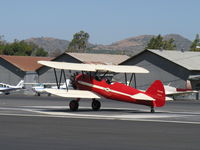N66711 @ SZP - 1941 Boeing Stearman IB75A, Jacobs R755B2 275 Hp upgrade, takeoff roll Rwy 22 - by Doug Robertson