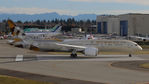 A6-BLA @ KPAE - Departing KPAE on it's first flight - by Woodys Aeroimages