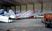 OH-VKU @ EFHK - OH-VKU   Lockheed 18-56 Lodestar [18-2006] (Kar-Air) Helsinki-Vantaa~OH 13/06/1988. Seen stored here in hangar prior to being put into the museum.. From a slide.