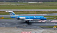 PH-KZB @ EDDL - KLM Cityhopper, is here on the taxiway at Düsseldorf Int'l(EDDL), ready for the short hop to Amsterdam Shiphol(EHAM) - by A. Gendorf