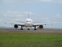 9V-SVL @ NZAA - head on taxyway - by magnaman