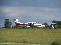 ZK-CGW @ NZNE - under tow at home base - by magnaman