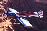 N545EA @ KSGU - MXS-R with bad to bone paint job, high energy aerobatics! - by John Teas