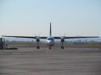 VH-FKO @ NZAA - full frontal from short term car park - by magnaman
