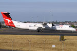 VH-QOB @ YSSY - taxiing from 34R - by Bill Mallinson