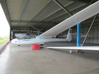 ZK-GEO @ NZTG - inside gliding club hangar - by magnaman