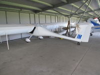 ZK-GIM @ NZTG - in glider club hangar - by magnaman