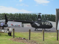 ZK-IVS @ NZAR - outside heliflite - by magnaman