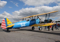 N300LY @ 4N1 - Airshow spectators , admiring an aerobatic display, surround a World War II Stearman. - by Daniel L. Berek