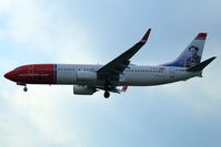 LN-NGG @ LLBG - Landing on runway 12, cloudy day, managed backlight. The painting on its tails is a portrait of Gunnar Sonsteby, a resistance hero. - by ikeharel