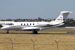 VH-LYM @ YSSY - taxiing to 34R - by Bill Mallinson