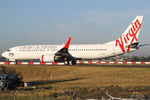 VH-VUM @ YSSY - taxiing to 34R - by Bill Mallinson