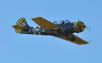 G-OUGH @ EGFH - Resident Yak-52 low pass over Runway 04. - by Roger Winser