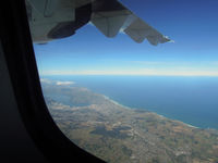 ZK-MCB - Climbing out of Dunedin - by Micha Lueck