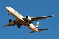 A6-EBU @ EGLL - Boeing 777-31HER [34484] (Emirates Airlines) Home~G 03/02/2011. On approach 27R. - by Ray Barber