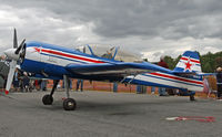 N54CP @ 4N1 - Sukhoi builds some of the sleekest aircraft around, be they fighters, trainers, aerobatic aircraft, or even an airliner.  This example was built in 1993. - by Daniel L. Berek