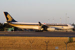 9V-STT @ YSSY - taxiing on 34L - by Bill Mallinson