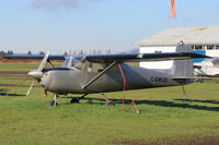C-GWJD @ CAK3 - Tied down - by Guy Pambrun