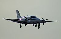 N727SC @ KMDW - Piper N727SC on short final for 4R at Chicago Midway.  Note the nose gear not fully extended, moments later the gear collapsed upon landing on runway 4R. - by Bill Poturica