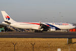 9M-MTC @ YSSY - taxiing off 43L - by Bill Mallinson