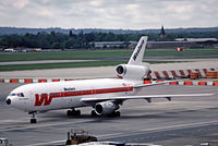 N821L @ EGKK - McDonnell Douglas DC-10-30 [47848] (Western Airlines) Gatwick~G (date unknown). From a slide. - by Ray Barber