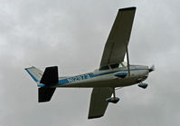 N12973 @ 4N1 - A 1973 Cessna Skyhawk peels away under a brooding sky. - by Daniel L. Berek