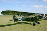 F-GLRV @ LFRU - Piper J3C-65, Static display, Morlaix-Ploujean airport (LFRU-MXN) air show in september 2014 - by Yves-Q