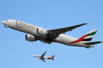 A6-EFN @ YSSY - As VH-VYG banks right after take off from 34R - by Bill Mallinson