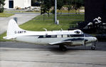 G-AWFM @ EGPF - Dove 6 of Fairey Surveys Limited as seen in the Summer of 1972 at Glasgow. - by Peter Nicholson