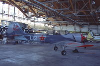 ES-PAB @ ESOW - Yakovlev Yak-52 in the hangar of the Västerås Flygmuseum.