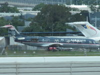 VH-FKL @ YBBN - at BNE - used for spares - by magnaman