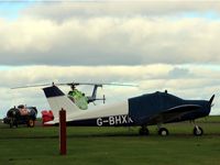 G-BHXK @ EGPT - Awaiting their next sorties from the grass at Perth EGPT. Sadly this aircraft crashed 05-04-15 near Oban, Scotland with two fatalities. RIP. - by Clive Pattle
