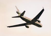 N1768D @ EGLL - McDonnell Douglas MD-11 participating in the Heathrow 50th anniversary flypast. - by moxy