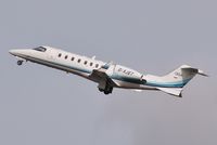 G-XJET @ EGHH - Climbing away from 26 - by John Coates