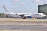 ZS-DJI @ EGHH - Captains Choice titles taxies to depart - by John Coates
