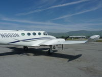 N888N @ E16 - A transient Cessna 340 sits in front of the South County Magnum Aviation hangar. - by Chris L.
