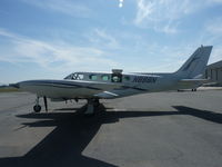 N888N @ E16 - A transient Cessna 340 sits in front of the South County Magnum Aviation hangar. - by Chris L.