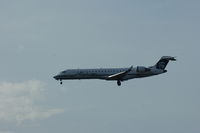 N218AG @ KSEA - Sky West, Alaska Airlines cs., is here landing at Seattle-Tacoma Int'l(KSEA) - by A. Gendorf