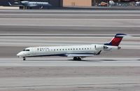 N613QX @ KLAS - CL-600-2C10